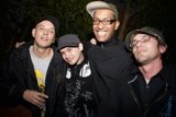 Four Men Strike a Pose