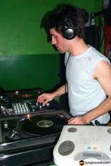 Spinning the Sound: A Turntable DJ in Action