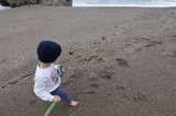 Little Explorer Discovers Treasures on Sandy Beach