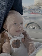 Baby's First Car Ride in Dappled Sunlight