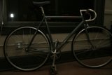 Parked Bicycle by the Window