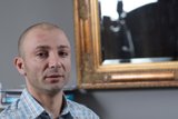 Bald Man in Plaid Shirt