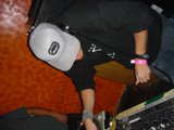 Grey Hat Performing Deejay