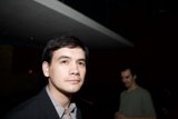 The Slick Businessman in the Shadows