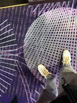 Standing on Abstract Purple Carpet with Halftone Pattern