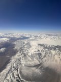 Aerial View of Snow-Capped Mountain Valley
