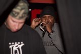 Steve J's Musical Performance Caption: Steve J rocks the stage with his beanie and microphone during his musical performance on September 26, 2006.