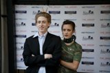 Fashionable Couple at Art Ride Event