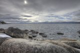 Rocky Shoreline with Ocean and Mountain View