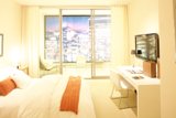 Cozy bedroom with modern technology