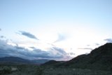 Majestic mountain range under cloudy skies