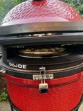 Grilled Pizza on a Red BBQ Grill