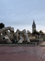 Deconstructed Architecture Against Ferry Building Clock Tower at Dusk