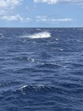Majestic Wave and Distant Boat in Hawaiʻi
