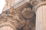 Ancient Religious Structure with Pillars and Flowers