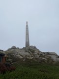 Monument atop a Hill with Majestic Rocks