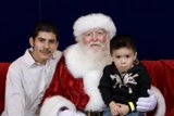 Christmas Cheer with Santa and a Little Helper