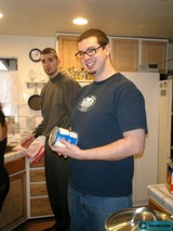 Man Holding a Can of Food