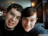 Smiling Couple Poses for New Year's Eve Selfie
