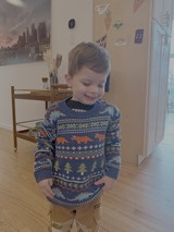 Young Boy in Festive Holiday Sweater