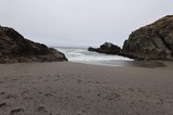Secluded Cove Between Rocky Cliffs at Dusk