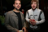 Grey Jacketed Man with Friends