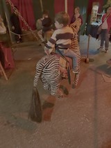 Children Playing Pirates with Rope in Home