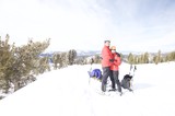 Couple Embracing at Snowy Lake Tahoe Summit