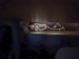 Child Sleeping Peacefully on Living Room Couch
