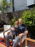 Man and Dog Enjoying Backyard