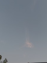 Mysterious Mountain Peak Through Overcast Sky