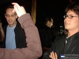Man in Black Jacket at Pub