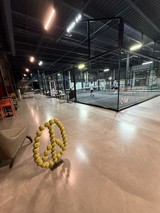 Modern Indoor Padel Tennis Court at Night