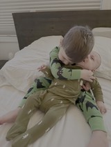 Brothers Sharing Sweet Morning Cuddle Time