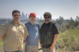 Three Men Enjoying a Picturesque View
