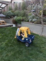Childhood Play in a Backyard Garden Oasis