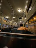 Nighttime Journey on a Busy City Bus