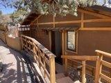 A Cozy House with a Wooden Railing