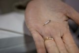 Needle in Hand