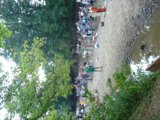 A Throng of Folks on a Gravel Road