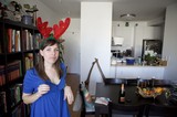 Unamused Woman in Reindeer Antlers on Christmas Day
