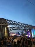 Dusk Crowd Under the Bridge