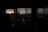 Sunset over the City from a Penthouse Window