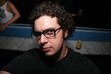 Portrait of Dave B wearing glasses