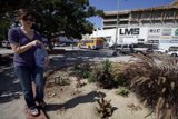 Plant Lady Poses with Pickup Truck