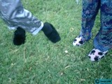 Slipper-wearing duo on the grass