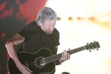 Roger Waters Rocks the Stage with His Guitar