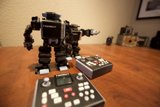 Playful Toy Robots Share a Wooden Table