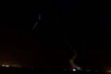 Rocket Launch Under a Starry Night Sky
