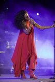 Solange Eyes Closed Singing Mic Stand Cord Loop Purple